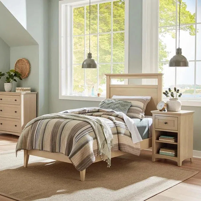 Comodino robusto e semplice con un solo cassetto